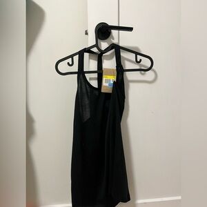 SMALL NIKE running shirt
Tank top
Never worn with tags